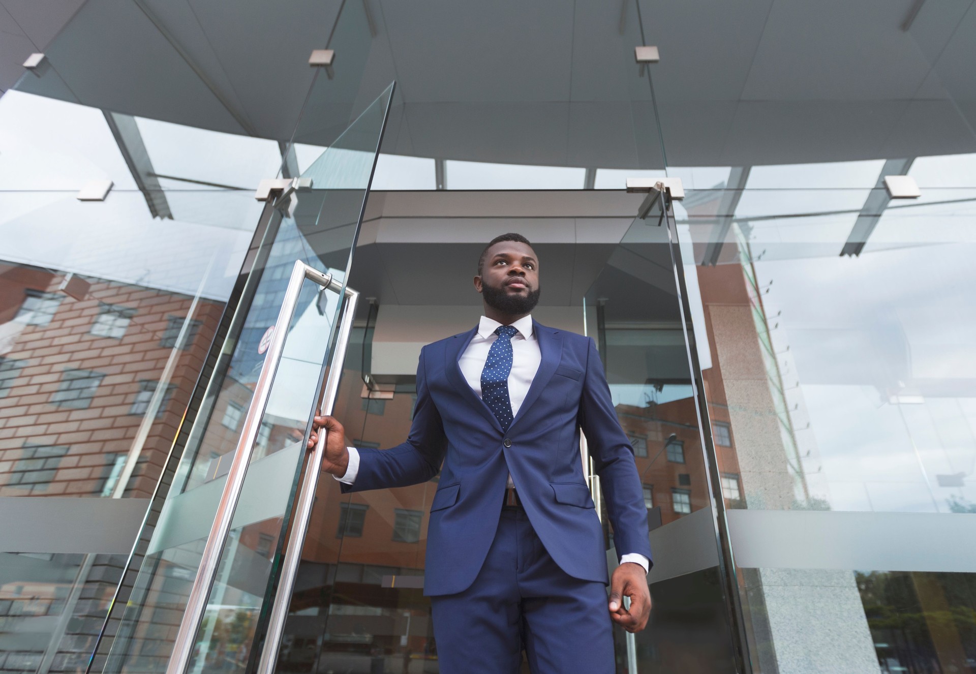 Personal bodyguard monitoring environment before boss will leave the building
